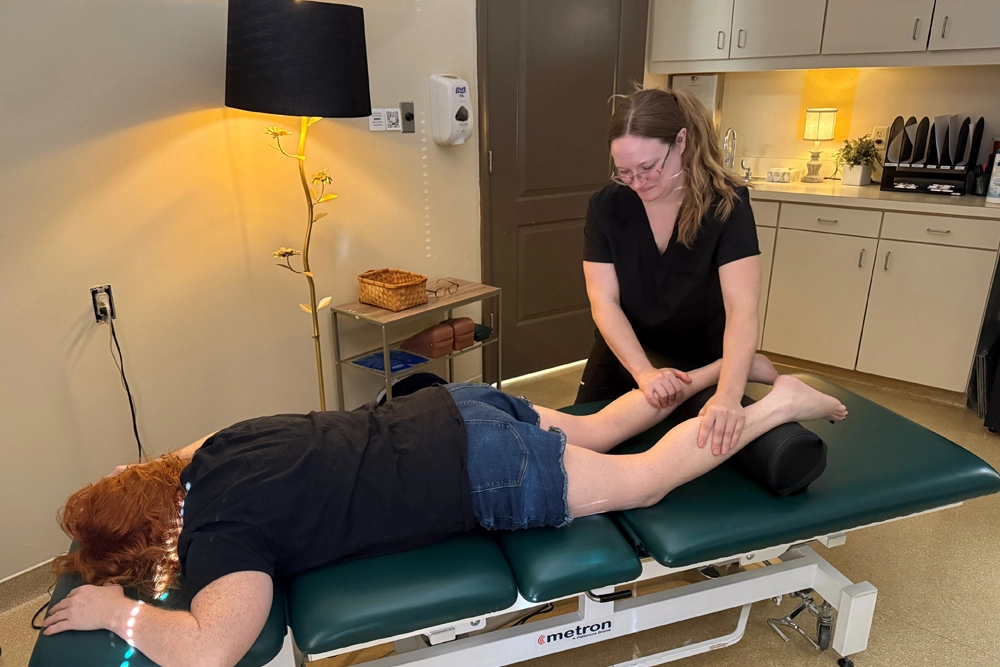Woman feeling radicular neuropathy symptoms